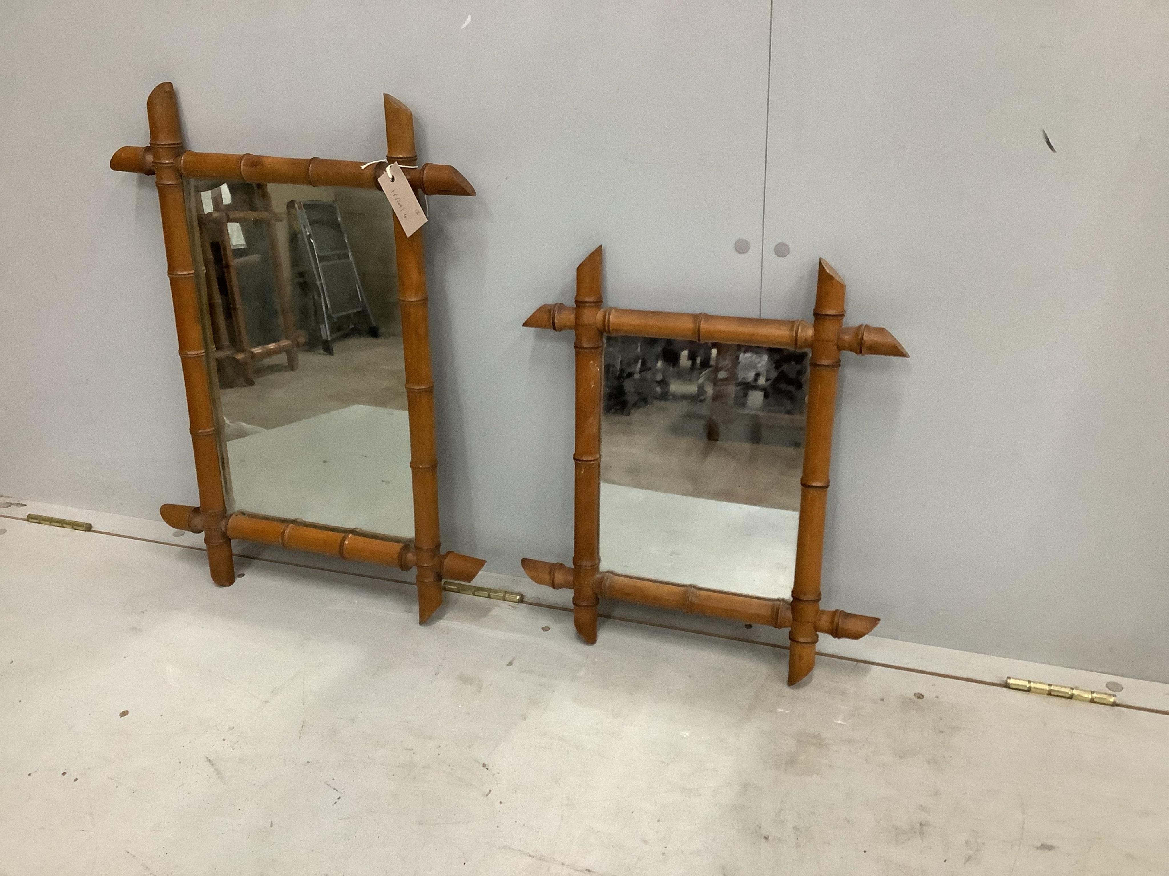 Two late 19th century French rectangular simulated bamboo wall mirrors, larger width 45cm, height 63cm. Condition - fair